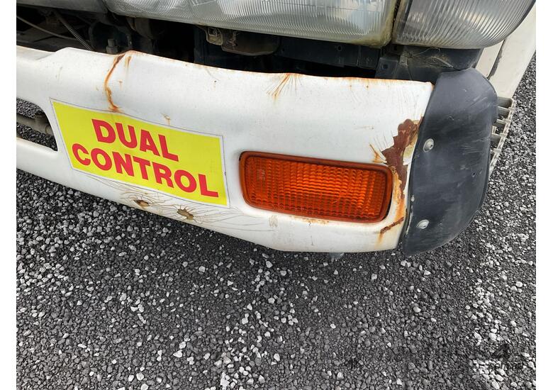 caption 2007 Nissan UD MK240 Dual Control Road Sweeper