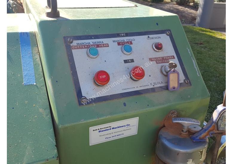 caption Single end tenoner with 2 tables