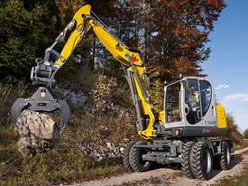 EW100 Wheeled Excavator - picture2' - Click to enlarge