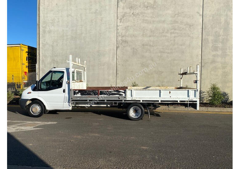 caption Ford Transit Tray Truck