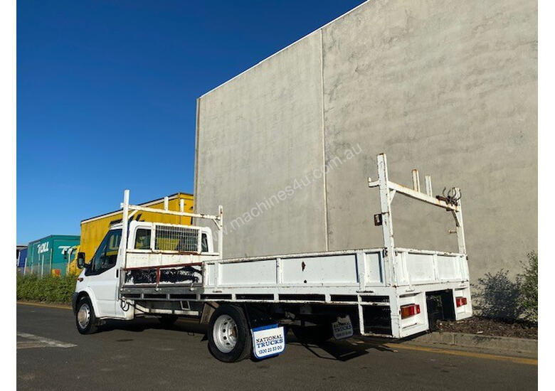 caption Ford Transit Tray Truck