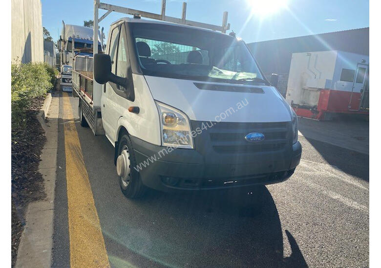 caption Ford Transit Tray Truck