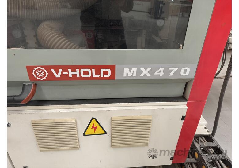 caption V-HOLD MX470 | High-Speed Double End Tenoner | 700mm Capacity | Precision & Efficiency