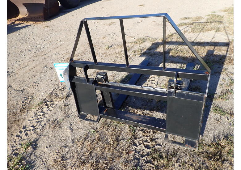 caption Fork attachment for skid steers
