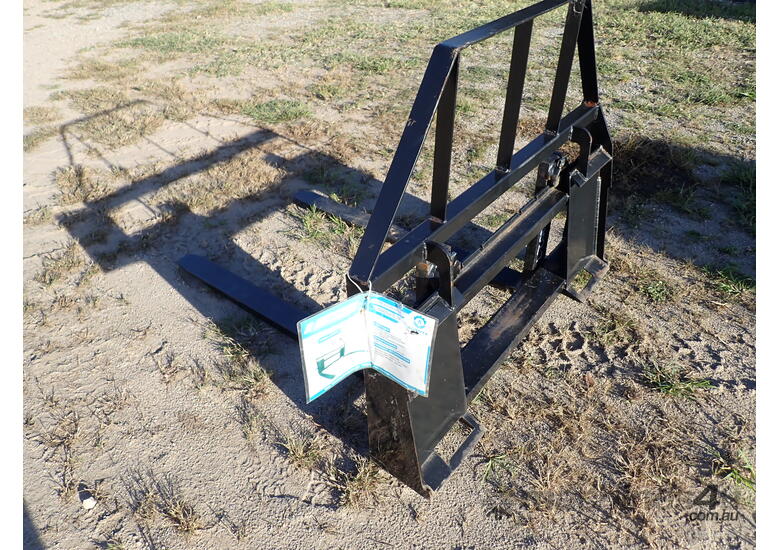 caption Fork attachment for skid steers