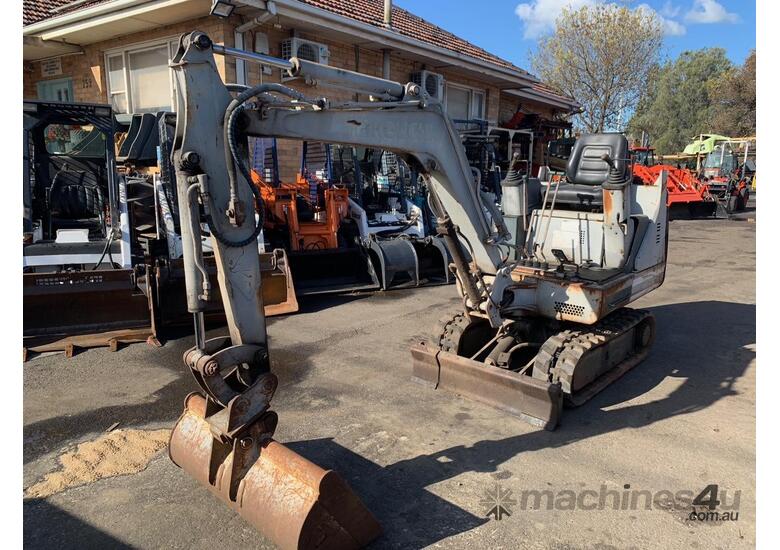 caption Takeuchi TB 015 Mini Excavator