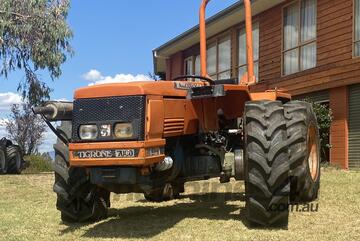 Rare, ultra stable tractor for steep country