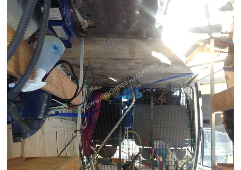 caption Cleaning equipment and Ford Transit van