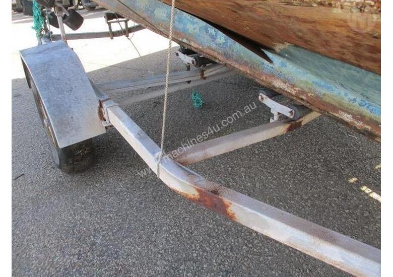 caption Unknown Make Boat + Trailer Combo