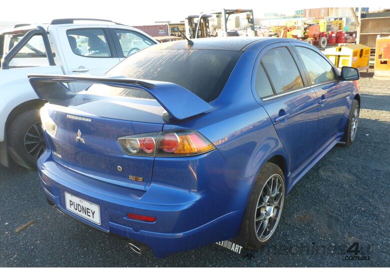 caption 2009 Mitsubishi Lancer CX/CY