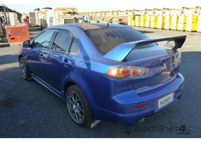 caption 2009 Mitsubishi Lancer CX/CY
