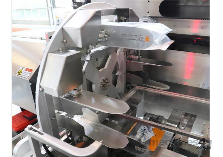 Horizontal premade pouch packing machne. High speed including sealing.