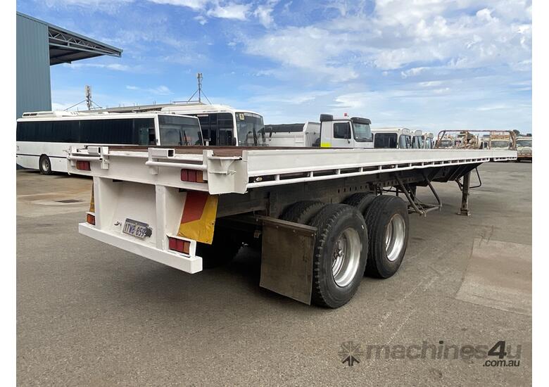 caption 1980 Fruehauf Extendable Flat Deck Trailer