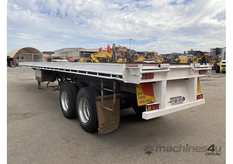 caption 1980 Fruehauf Extendable Flat Deck Trailer