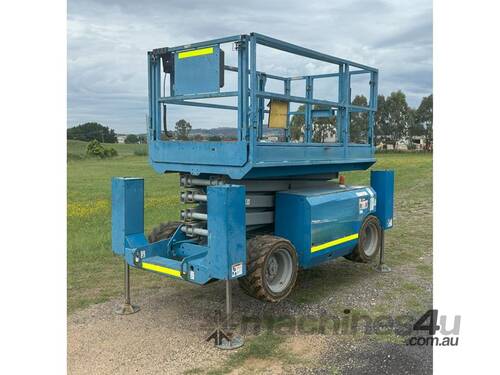 caption 2004 GENIE SCISSOR LIFT