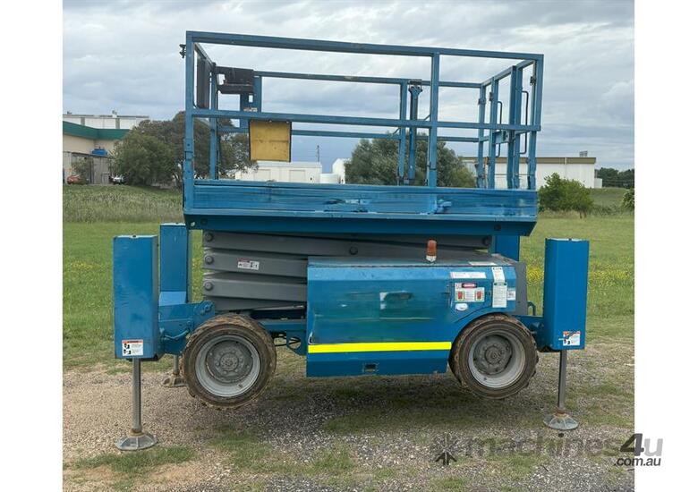 caption 2004 GENIE SCISSOR LIFT