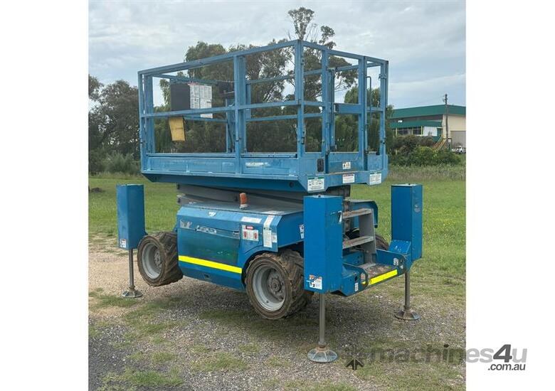 caption 2004 GENIE SCISSOR LIFT