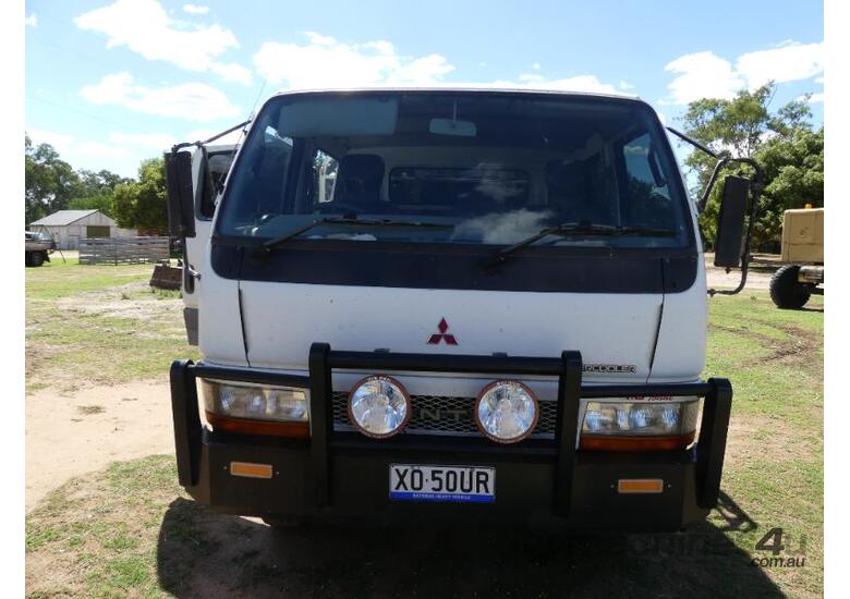 caption Mitsubishi Dual Cab Truck with sheep/calf Crate