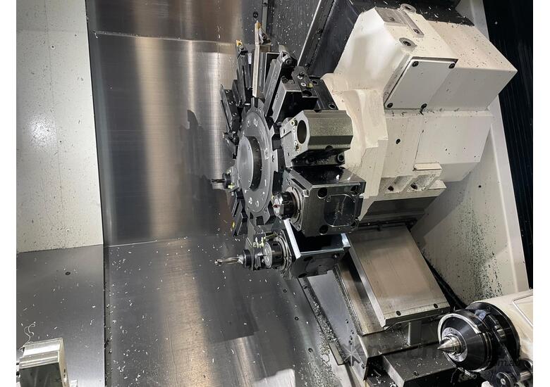 caption OKUMA GENOS LATHE MACHINE - HIGH-PERFORMANCE