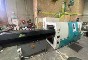 Doosan CNC lathe and bar feeder