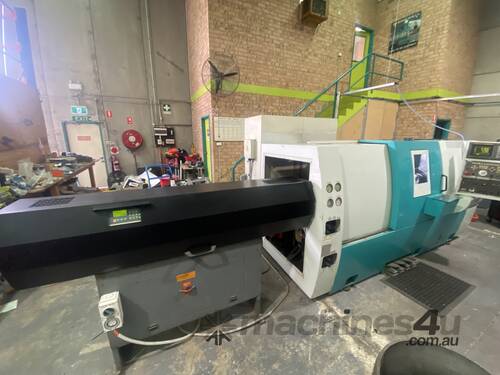 Doosan CNC lathe and bar feeder