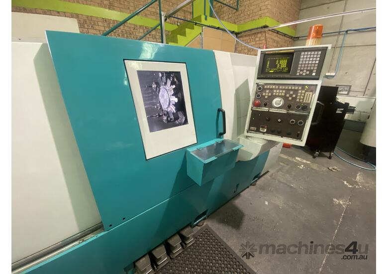 Doosan CNC lathe and bar feeder