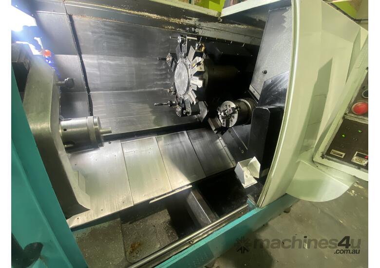 Doosan CNC lathe and bar feeder
