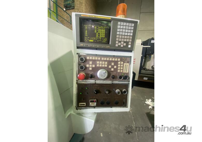 Doosan CNC lathe and bar feeder