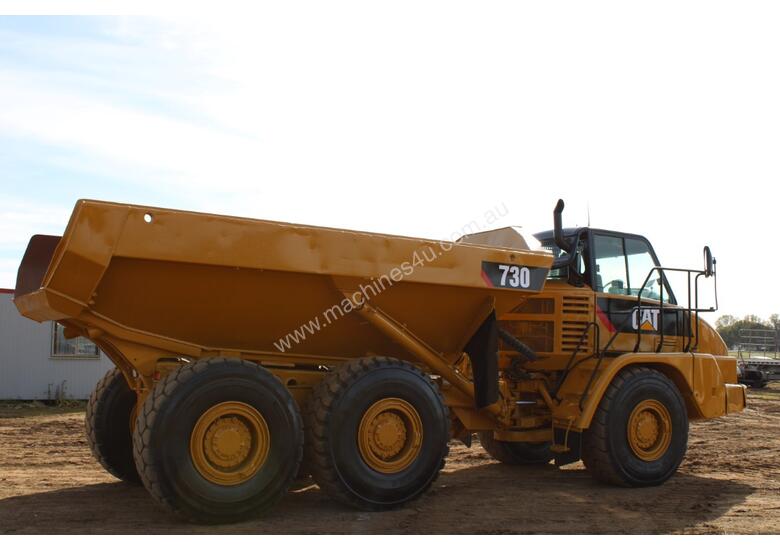 caption Caterpillar 730 Dump Truck