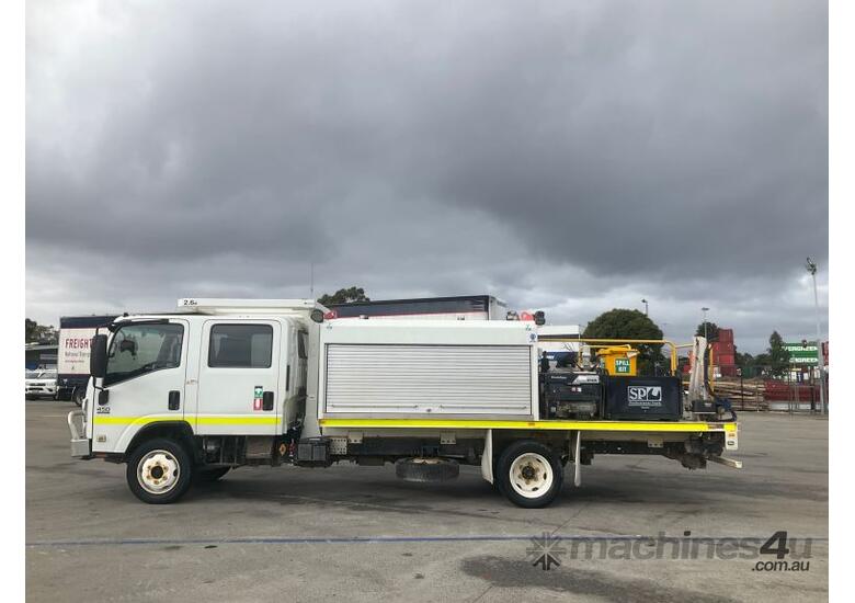 caption 2012 Isuzu NQR 450 Crew Dual Cab Service Body