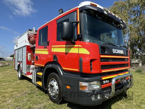 caption Scania P94D 300 4x2 Automatic Crewcab Firetruck. Ex QLD Fire & Rescue Service.