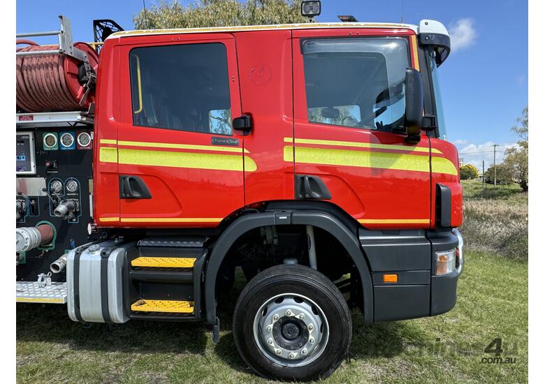 caption Scania P94D 300 4x2 Automatic Crewcab Firetruck. Ex QLD Fire & Rescue Service.
