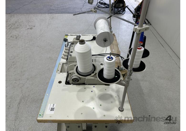 caption Juki Overlocker Machine