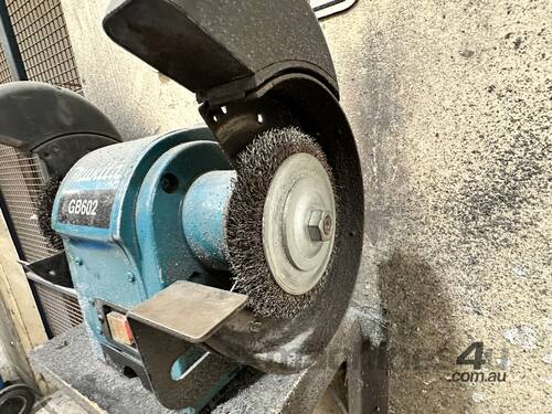 caption Makita GB602 Bench Grinder On Pedestal