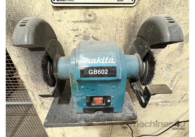 caption Makita GB602 Bench Grinder On Pedestal