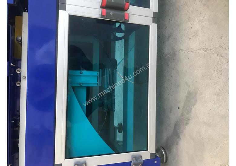 caption L-Bar Sealer with a Heat Shrink Tunnel