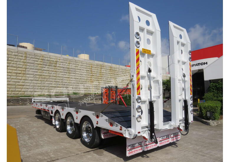 caption Interstate trailers Tri Axle Tag Trailer 28 Ton ELITE Orange ATTTAG
