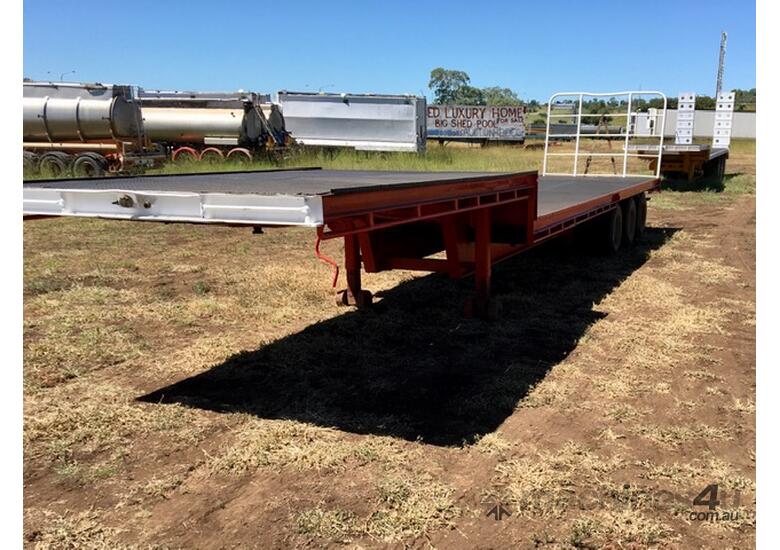 caption LOADMASTER step deck trailer