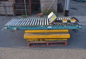Motorised powered 2.4m long 73cm wide roller conveyor system with scissor lift