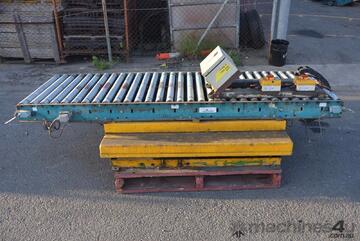 Motorised powered 2.4m long 73cm wide roller conveyor system with scissor lift