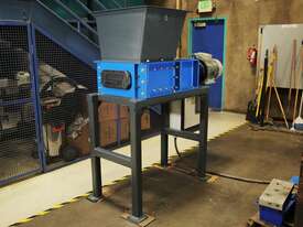SSI Dual-Shear M45 Two shaft shredder - picture0' - Click to enlarge
