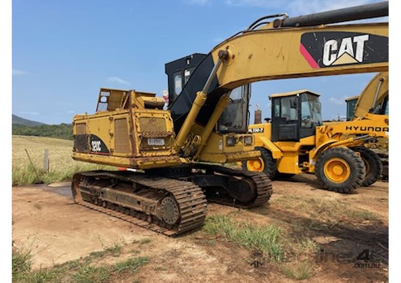 caption 2000 CATERPILLAR 320C WITH LOG GRAB & WARATAH 616C HEAD
