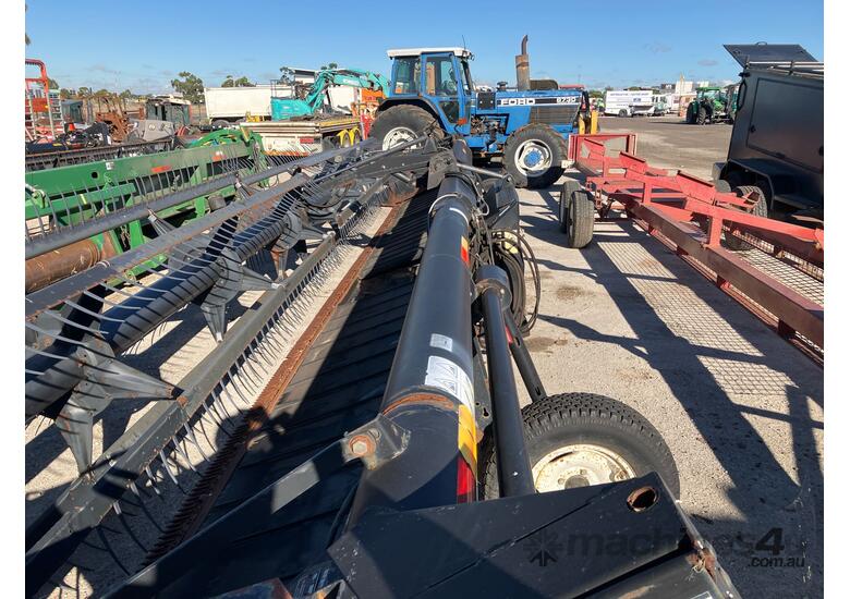 caption MacDon 9352 Header Front & Trailer Combination