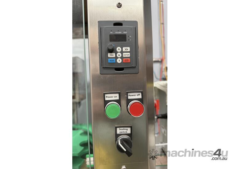caption Used Automatic Inline ROPP Capper - Distillery Equipment
