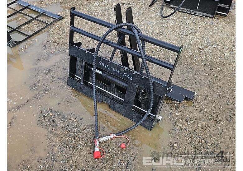 caption Unused Captok Side Shift Forks to suit Mini Skidsteer Loader
