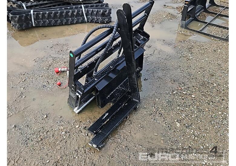 caption Unused Captok Side Shift Forks to suit Mini Skidsteer Loader