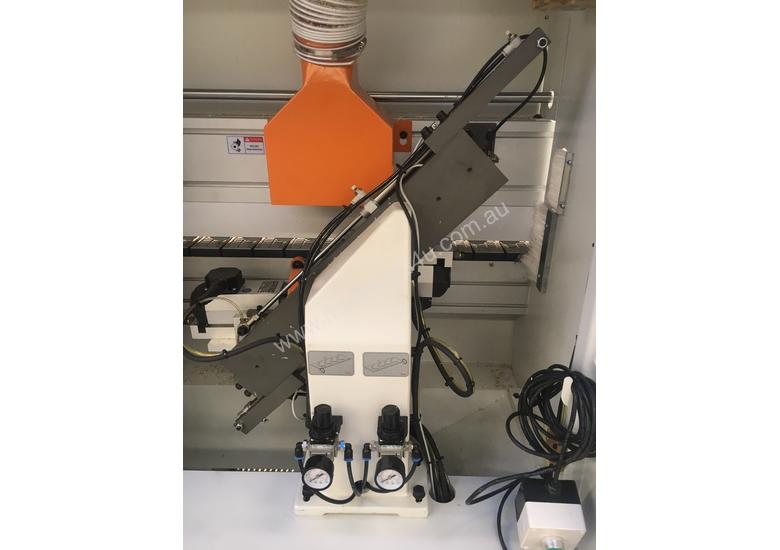 caption KDT 468J High speed Edger with Premilling and twin sets of trimmers