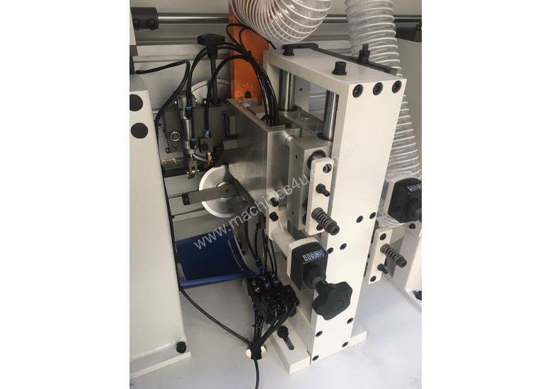 caption KDT 468J High speed Edger with Premilling and twin sets of trimmers