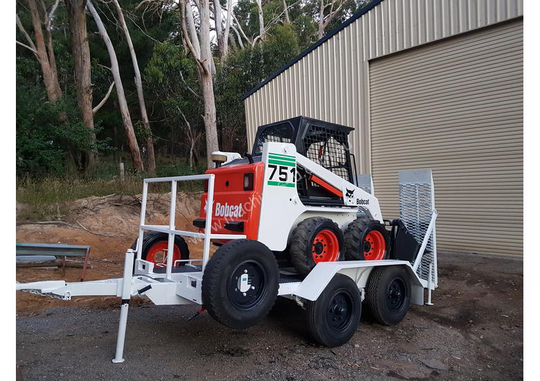 caption Skid steer loader
