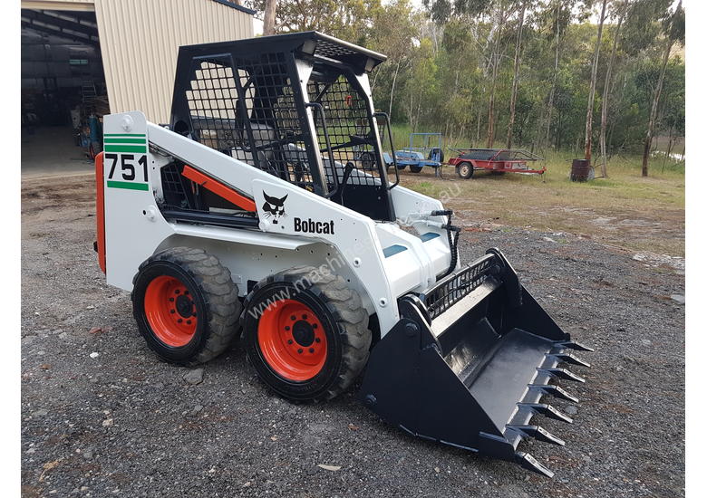 caption Skid steer loader